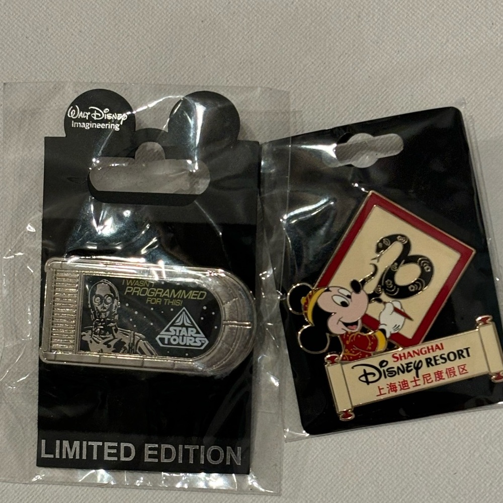 Disney pins - Star tours I wasn’t programmed for this and Disney Shanghai resort
